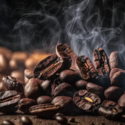 Close-up of steaming roasted coffee beans, piled on a dark surface. The scene conveys warmth and a rich, inviting aroma against a blurred, dark background.